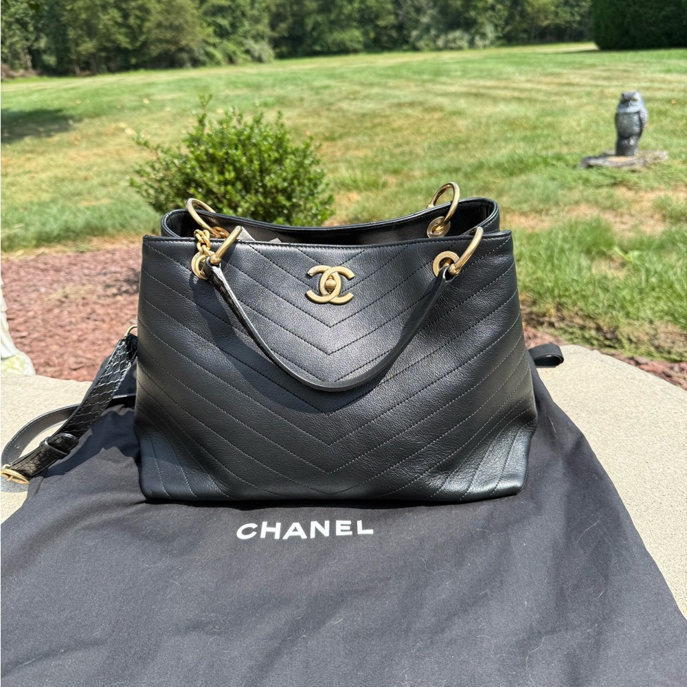 CHANEL Black Shoulder Bag with Gold Accents